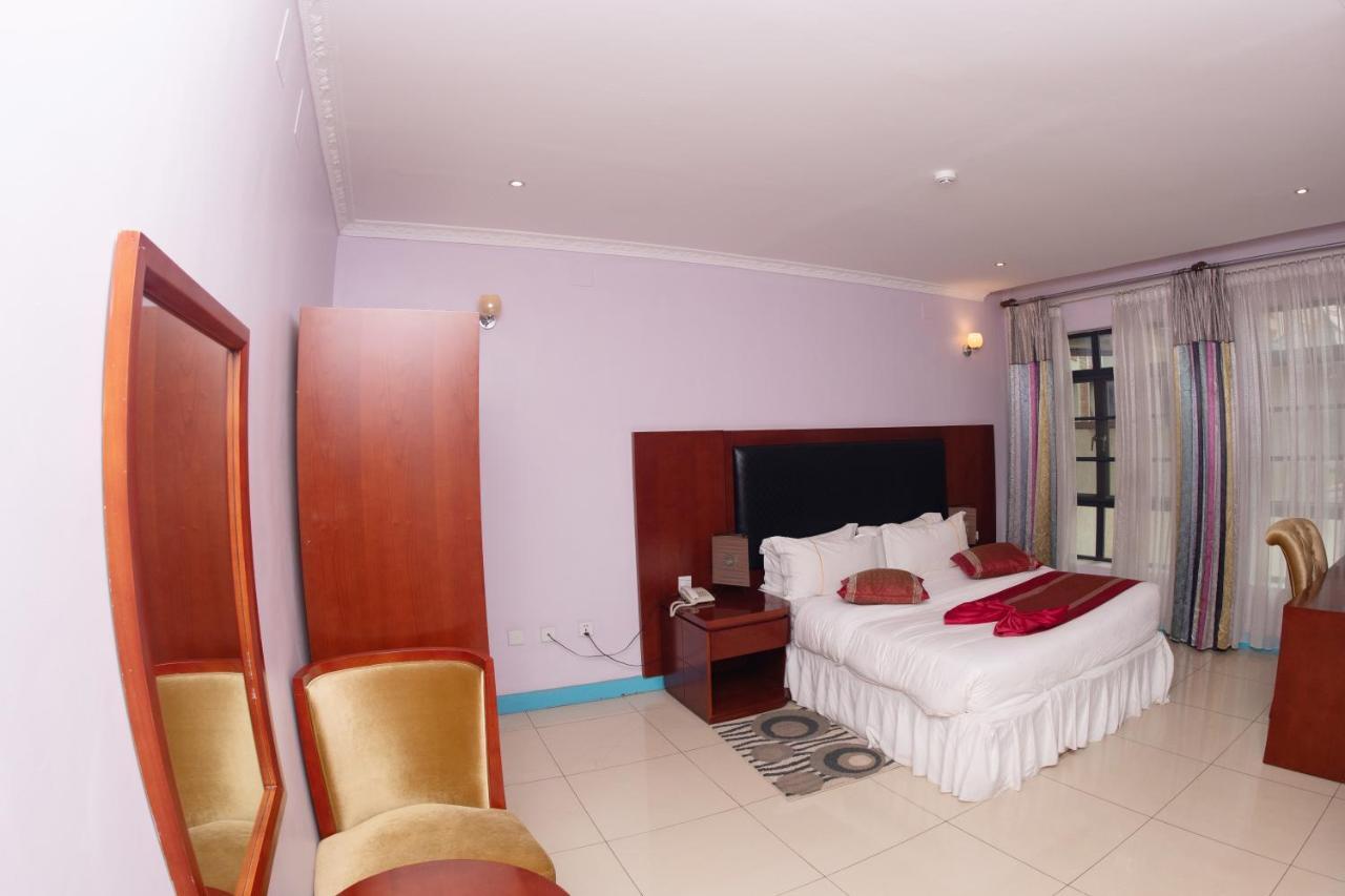 Orient Park Hotel Кигали Екстериор снимка